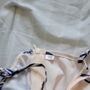 Elegant Cream and Navy Striped Dress